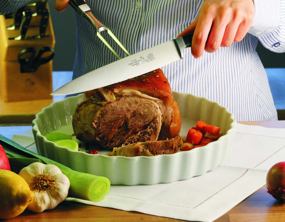 Werbeaufnahme - Fleischmesser mit Fleischgabel. (Oliver Stamm Werbefotograf Fotodesigner)