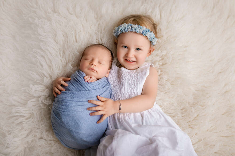 Baby mit Geschwister (ZOOM TIME Fotodesign)