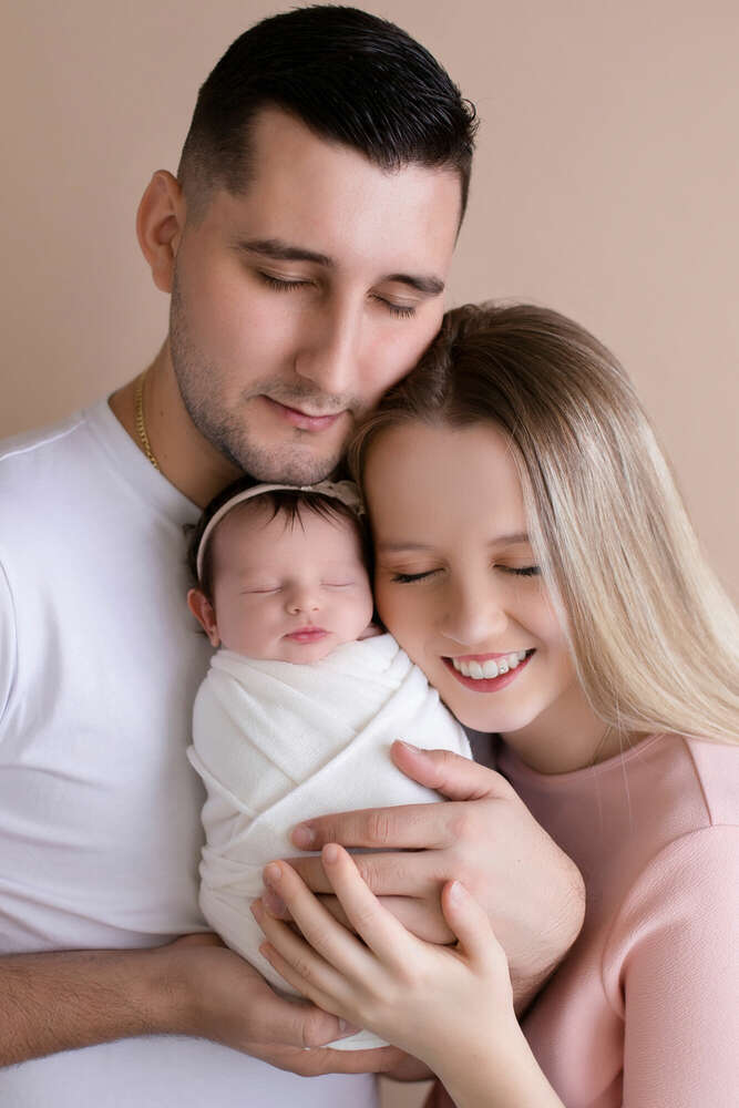 Babyshooting mit Familienbilder (ZOOM TIME Fotodesign)