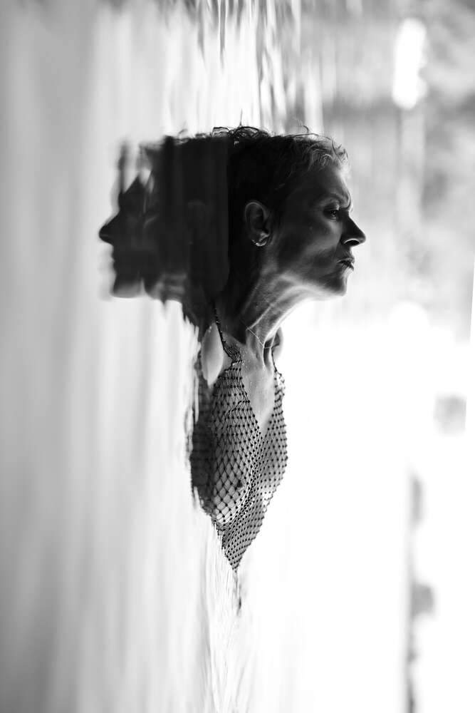 Portraifoto it Spiegelung im Wasser. (www.susannewatrin.de)