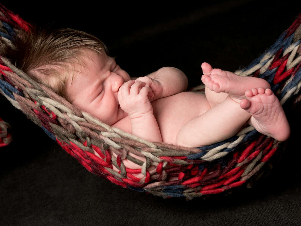 Baby in H&auml;ngematte (Foto Boutique Karin)