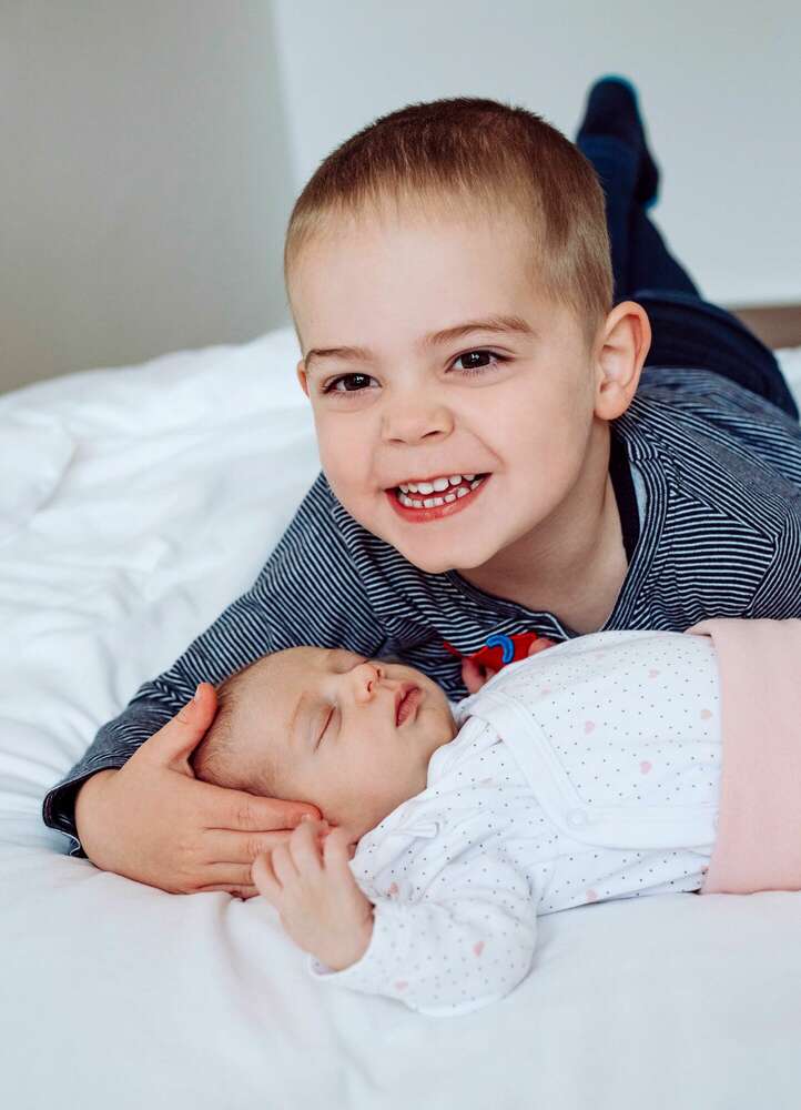 NewbornNewborn Familie (Portrait Salon Fotostudio Meisterbetrieb)