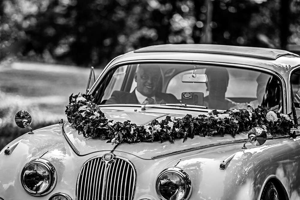 Brautpaar im Oldtimer (Christian Schmidt Fotografie)